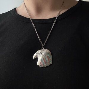 Silver toned red and blue etched fierce eagle necklace